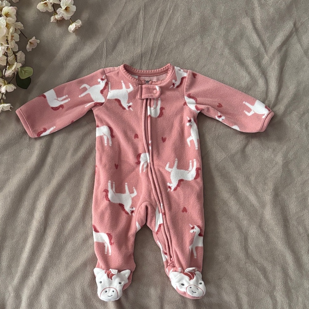 carter’s pink unicorn footed onesie